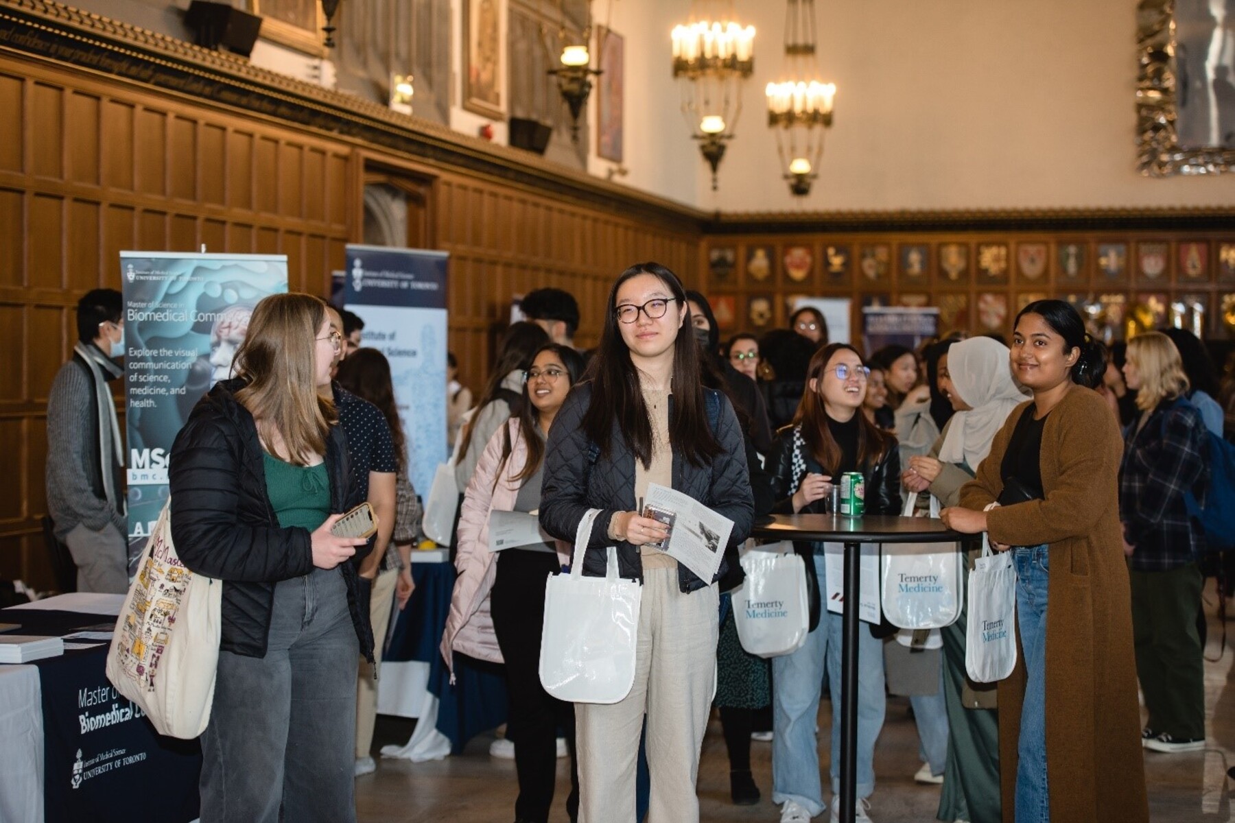 Prospective students gathered in Hart House at the 2023 Temerty Medicine Graduate Recruitment Fair